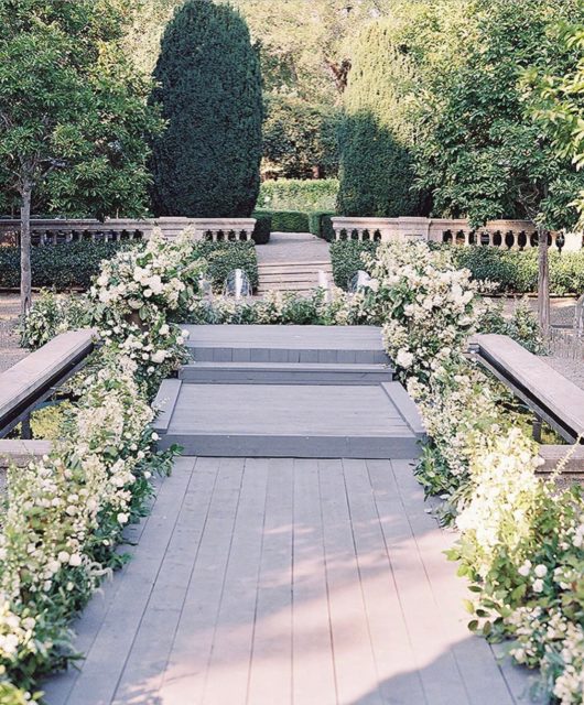 We’re always up for jumping in a fountain to build a ceremony walkway! Thank you to @jacinfitzgerald for the challenge.  @mindyricedesign always works wonders and what better setting for a ceremony than #beaulieugarden @paulaleduc.  Beautifully captured by @tecpetaja and on @caratsandcake today!  #zephyrtents